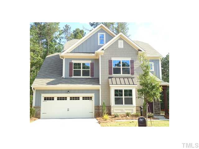 813 Wickham Ridge Road Apex, NC 27539 - Photo 1 of 25 Partial Stone and Cement Fiber Siding.