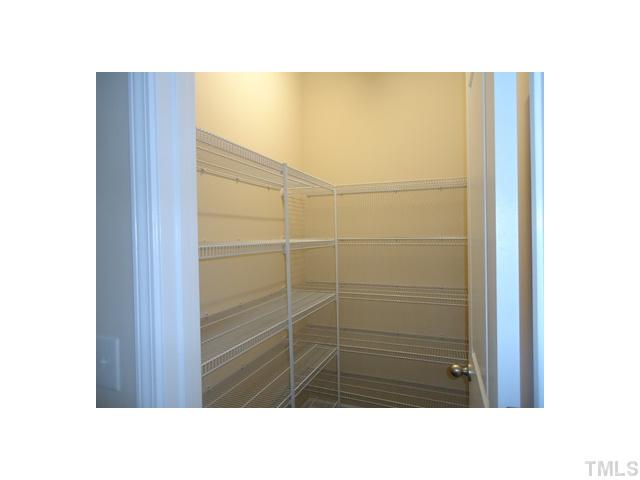 813 Wickham Ridge Road Apex, NC 27539 - Photo 14 of 25 Walk in Pantry.