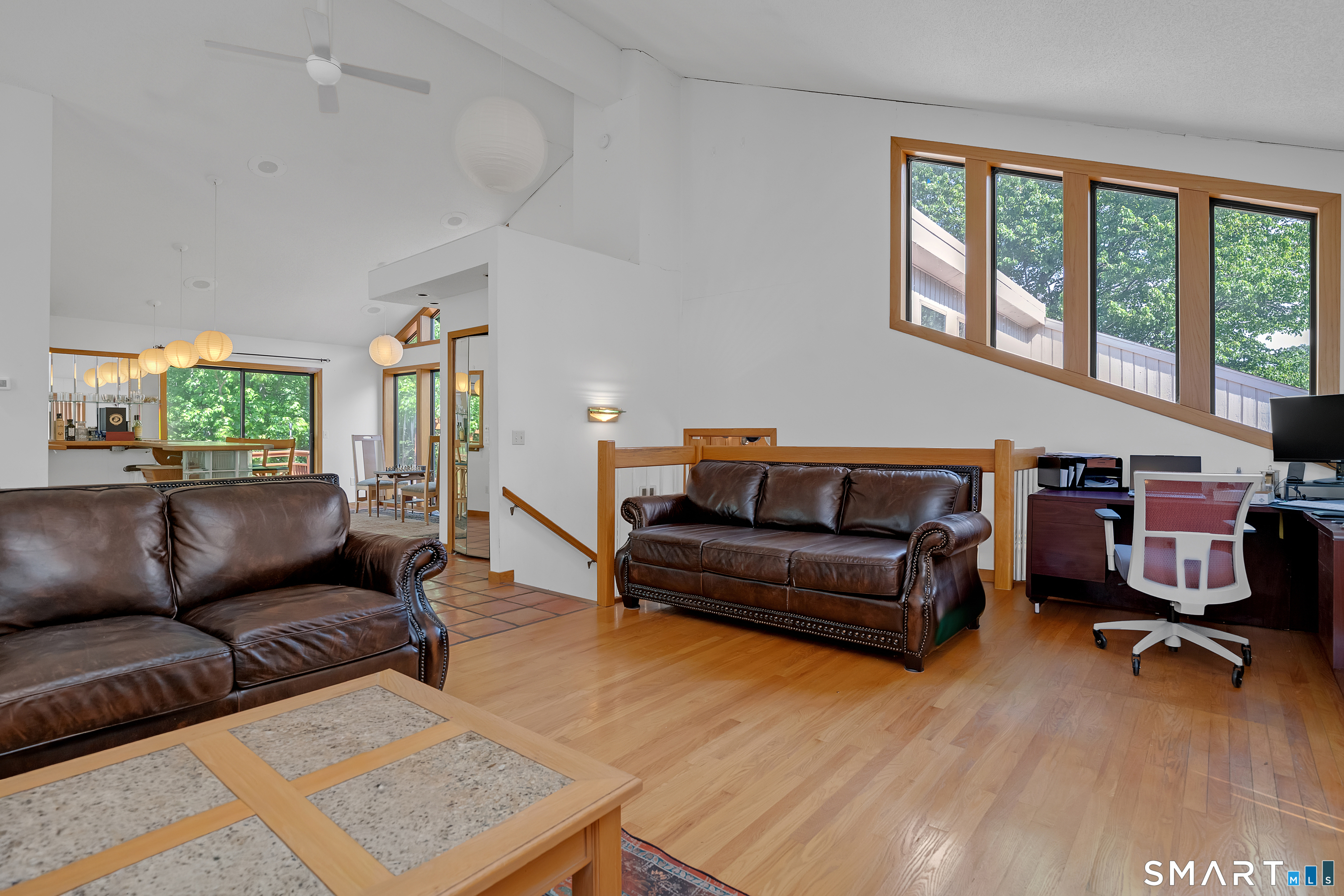 90 Bell Street Manchester, CT 06040 - Photo 13 of 40 a living room with furniture and a wooden floor