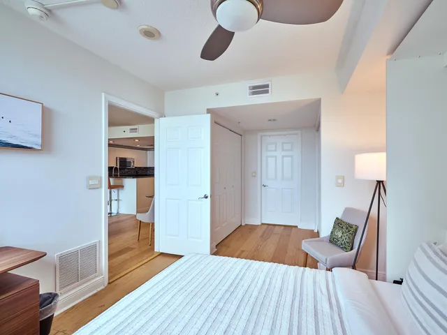a view of a livingroom with furniture and wooden floor