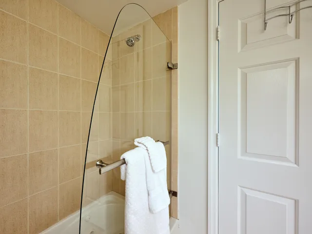 a room with gym equipment and a table