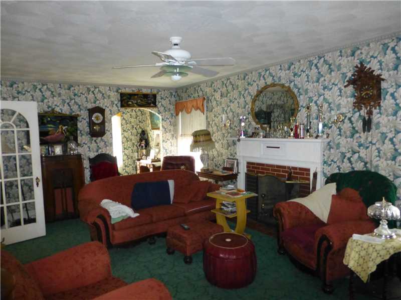 1320 Main Street Coventry, RI 02816 - Photo 4 of 11 Living Room. Double Living Room loaded with charm and character