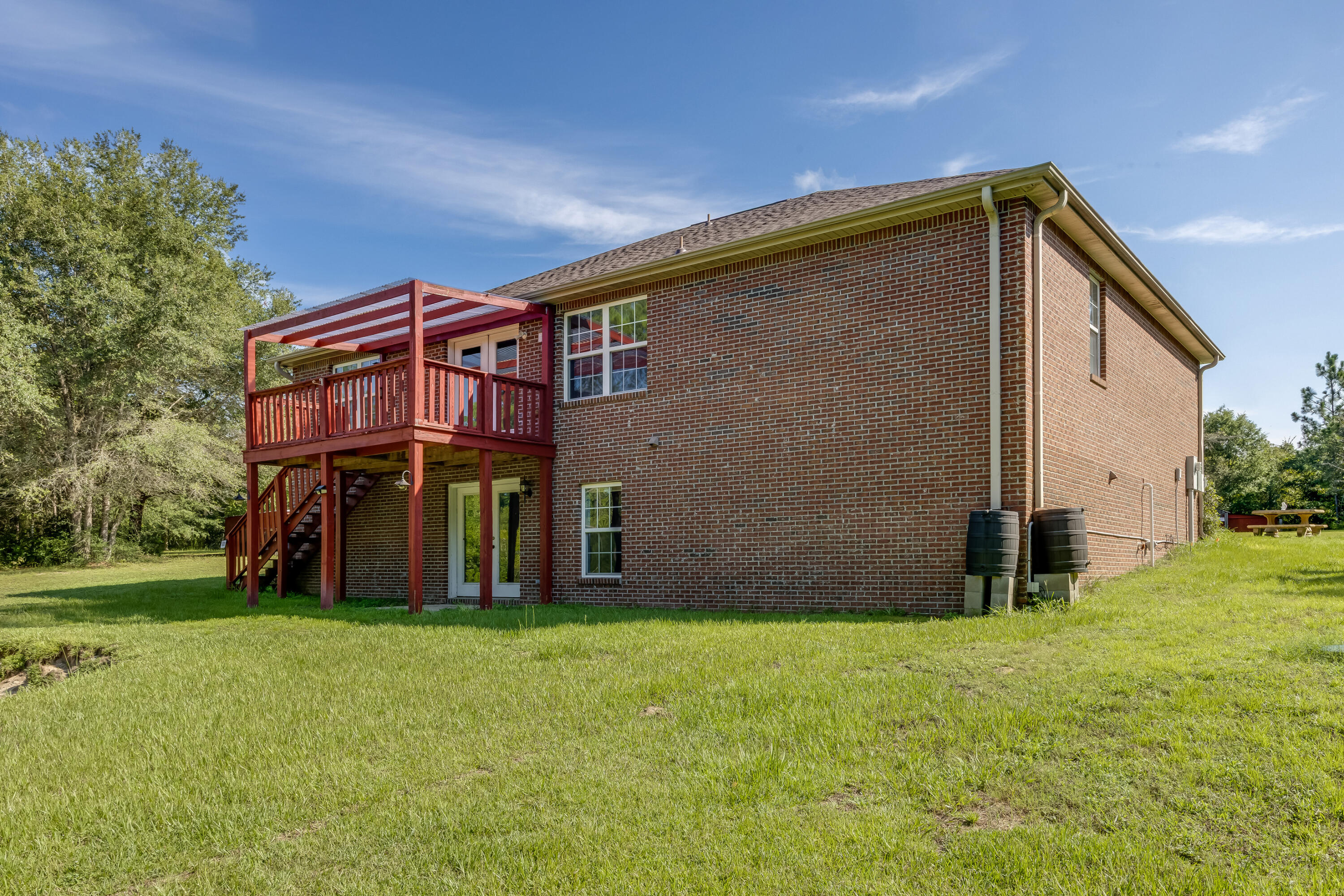 4555 Wolf Track Ridge, Unit 15 15 ACRES Crestview, FL 32539 - Photo 46 of 65 a view of front of house with a yard