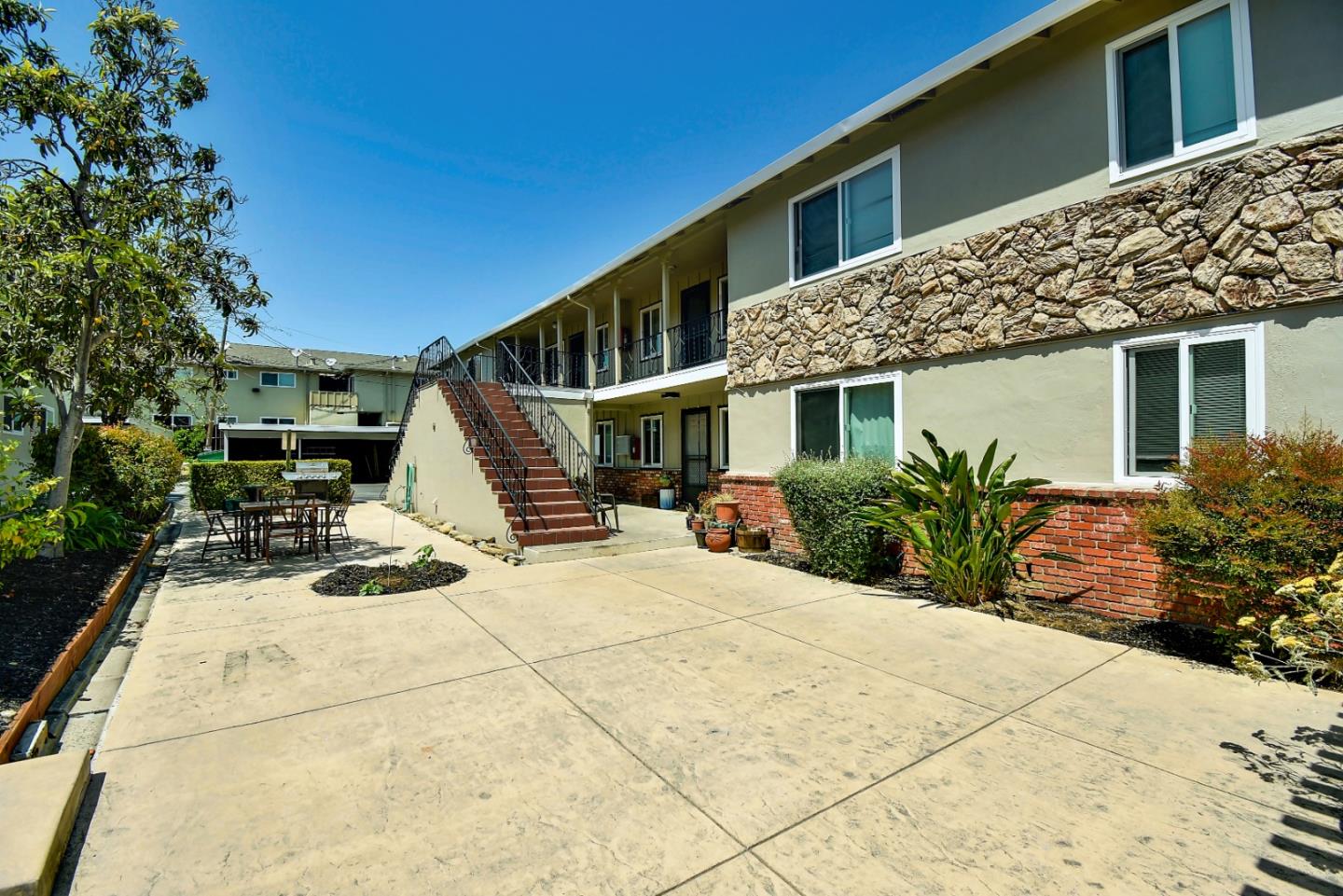 205 Avery Lane Los Gatos, CA 95032 - Photo 2 of 13 a view of a house with backyard porch and sitting area