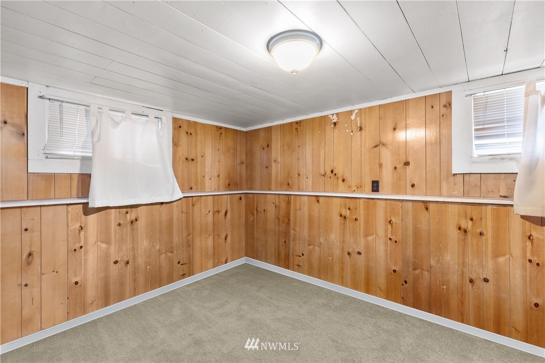 5069 Renton Avenue South Seattle, WA 98118 - Photo 31 of 40 a view of a garage with wooden walls
