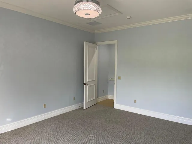 a view of a lake with a yard