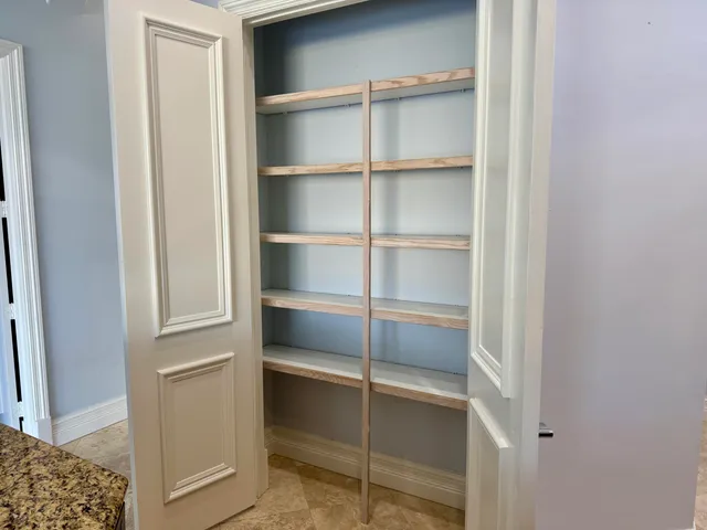 a view of a kitchen with an entryway