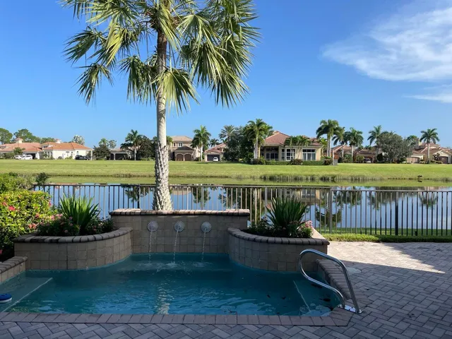 a view of a lake with a big yard
