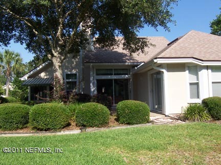1488 Marsh Rabbit Way Fleming Island, FL 32003 - Photo 14 of 17 a view of house with yard