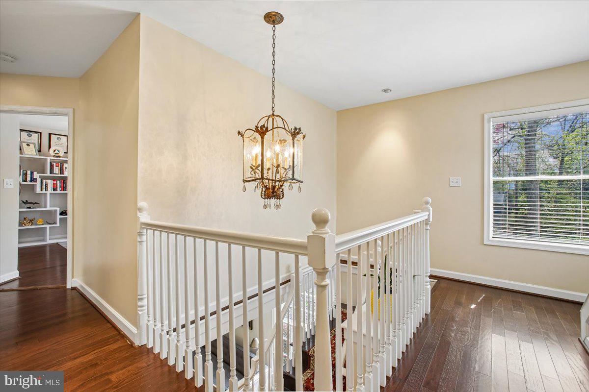 1305 Key Drive Alexandria, VA 22302 - Photo 21 of 64 a view of a room with wooden floor stairs and windows