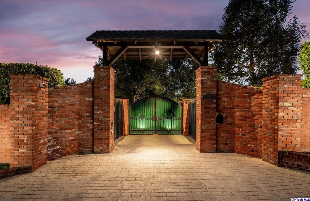 a view of a wooden door and an outdoor space