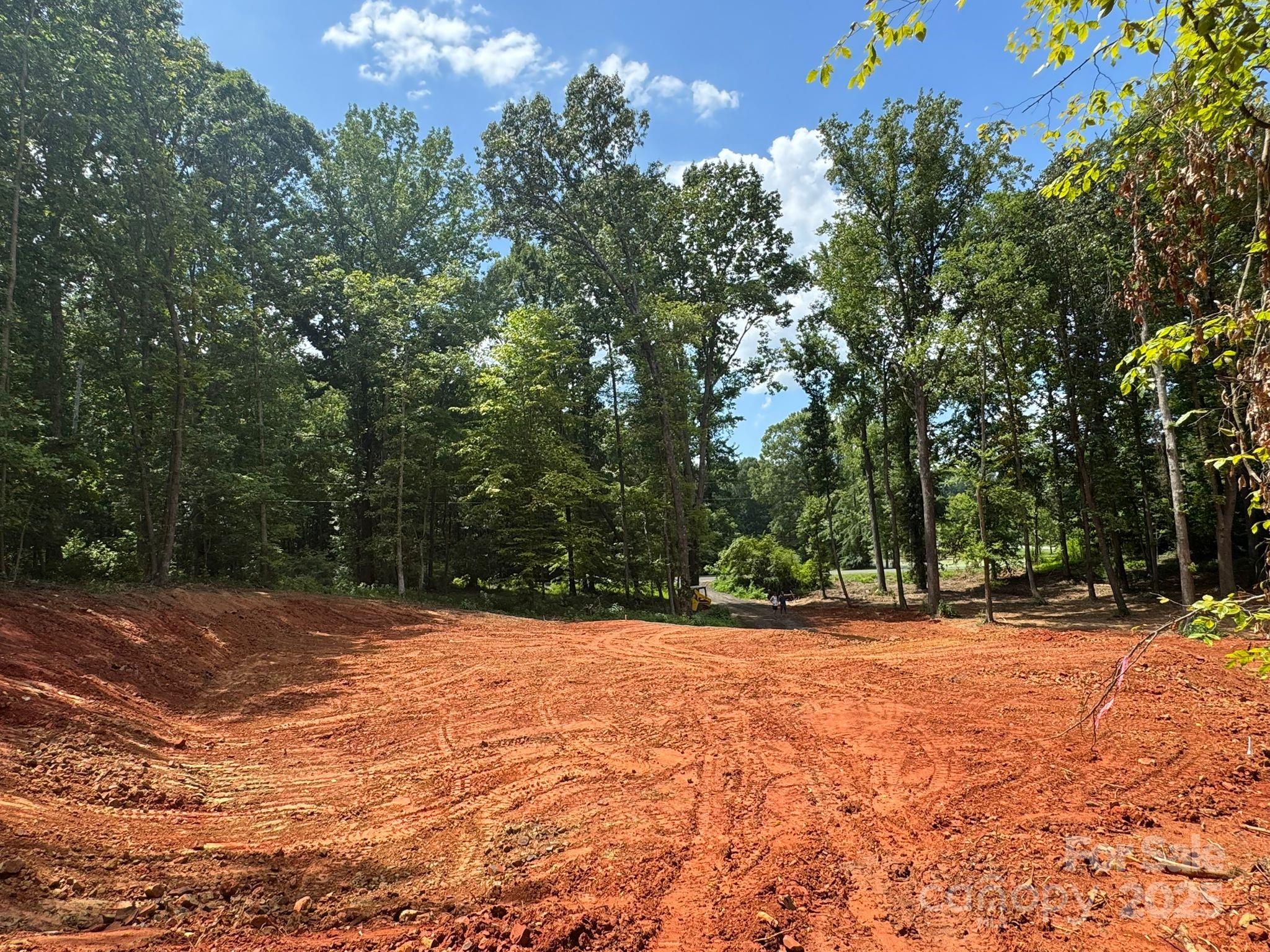 5904 McWhorter Road Waxhaw, NC 28173 - Photo 3 of 5 a backyard of a house with trees and houses