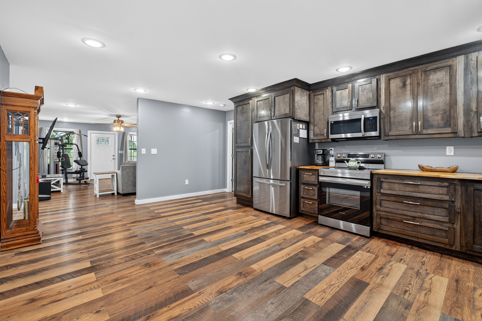 63 North King Road Flintville, TN 37335 - Photo 13 of 37 a kitchen with stainless steel appliances kitchen island granite countertop a refrigerator and a stove top oven