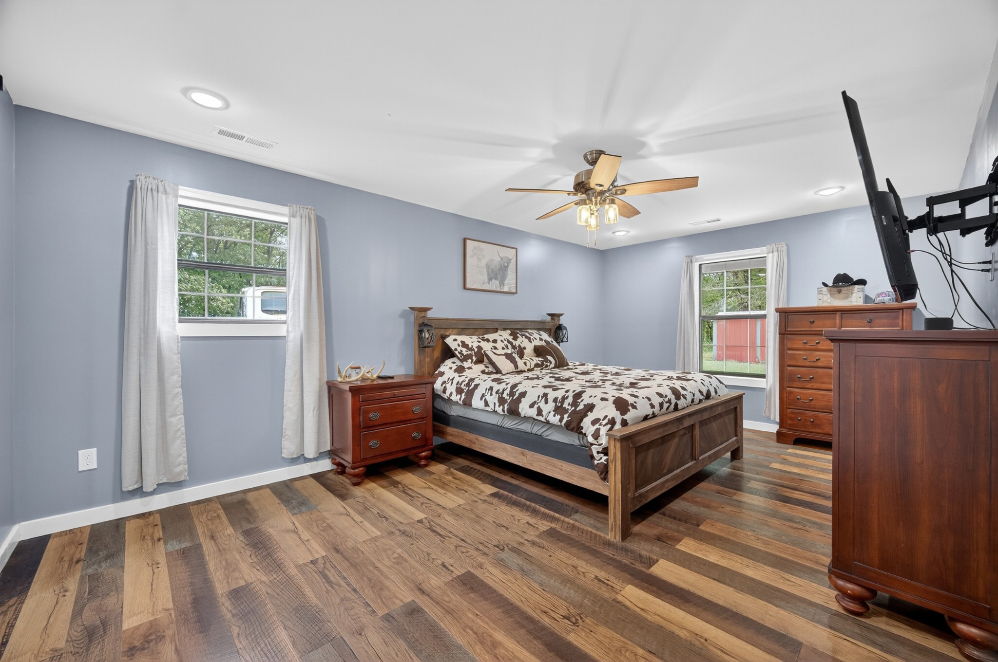 63 North King Road Flintville, TN 37335 - Photo 15 of 37 a bedroom with a bed and a chandelier