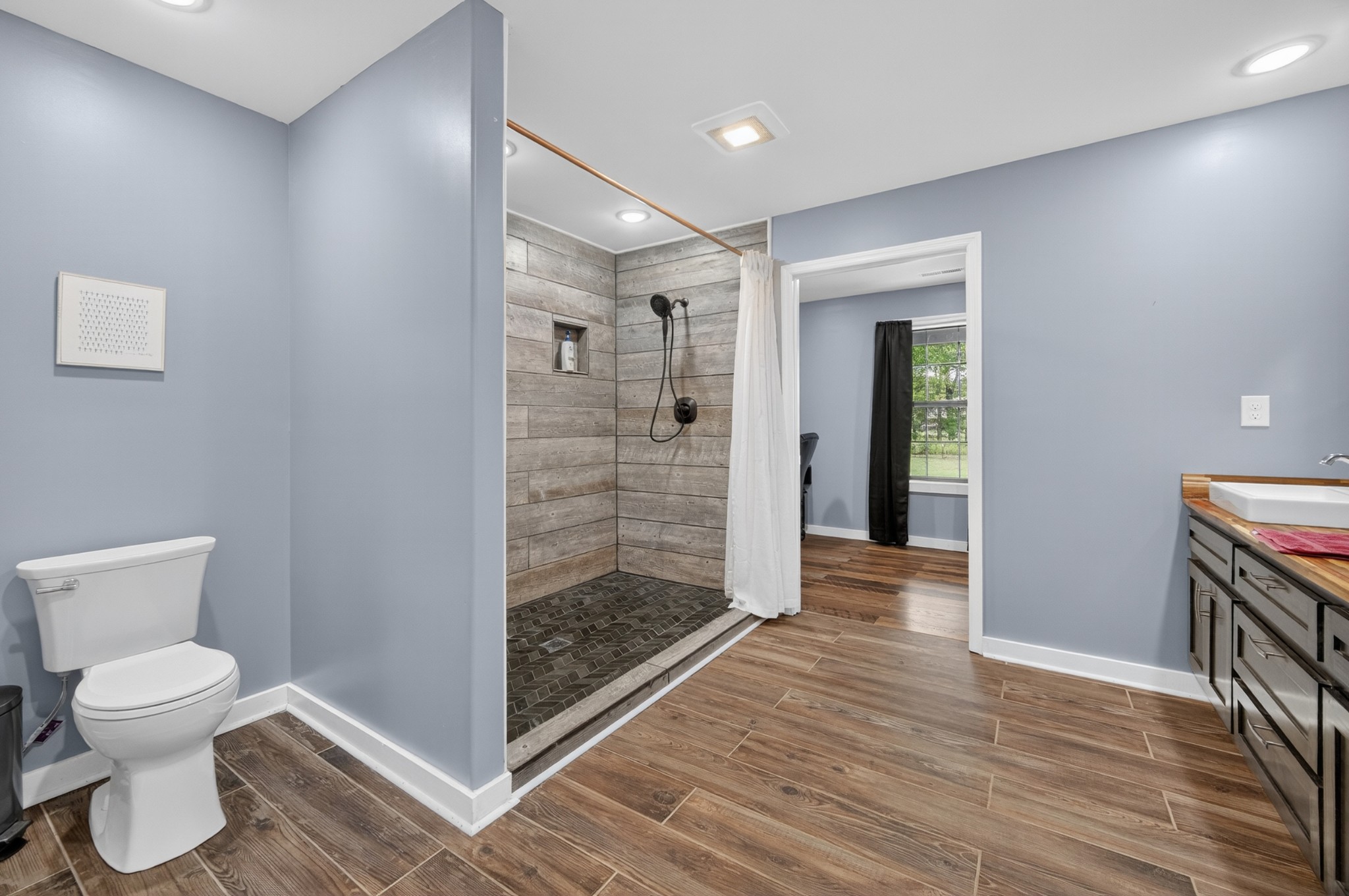 63 North King Road Flintville, TN 37335 - Photo 18 of 37 a bathroom with a toilet and a shower