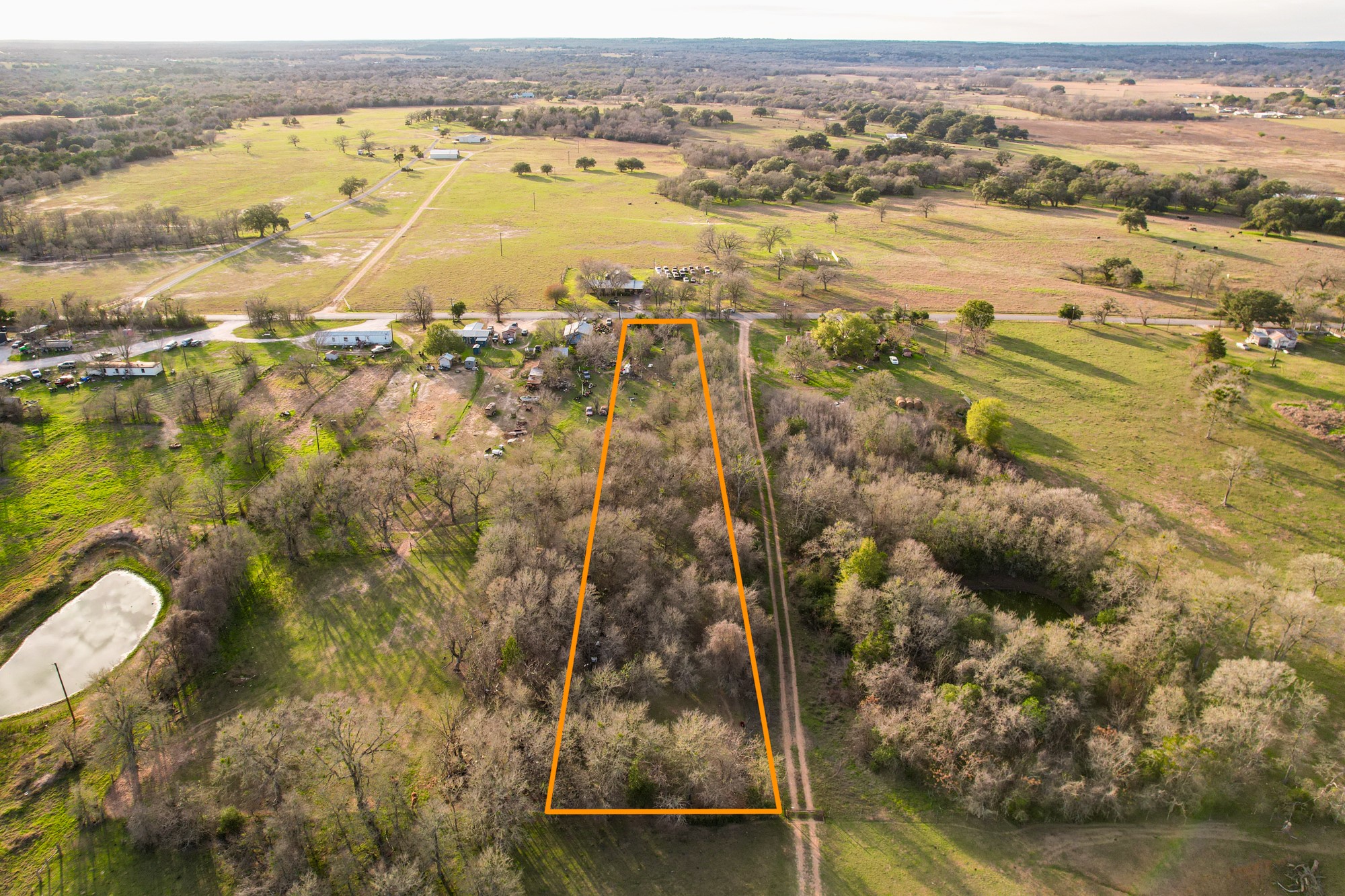 269 Old Lake Road Smithville, TX 78957 - Photo 12 of 16 an aerial view of residential houses with outdoor space