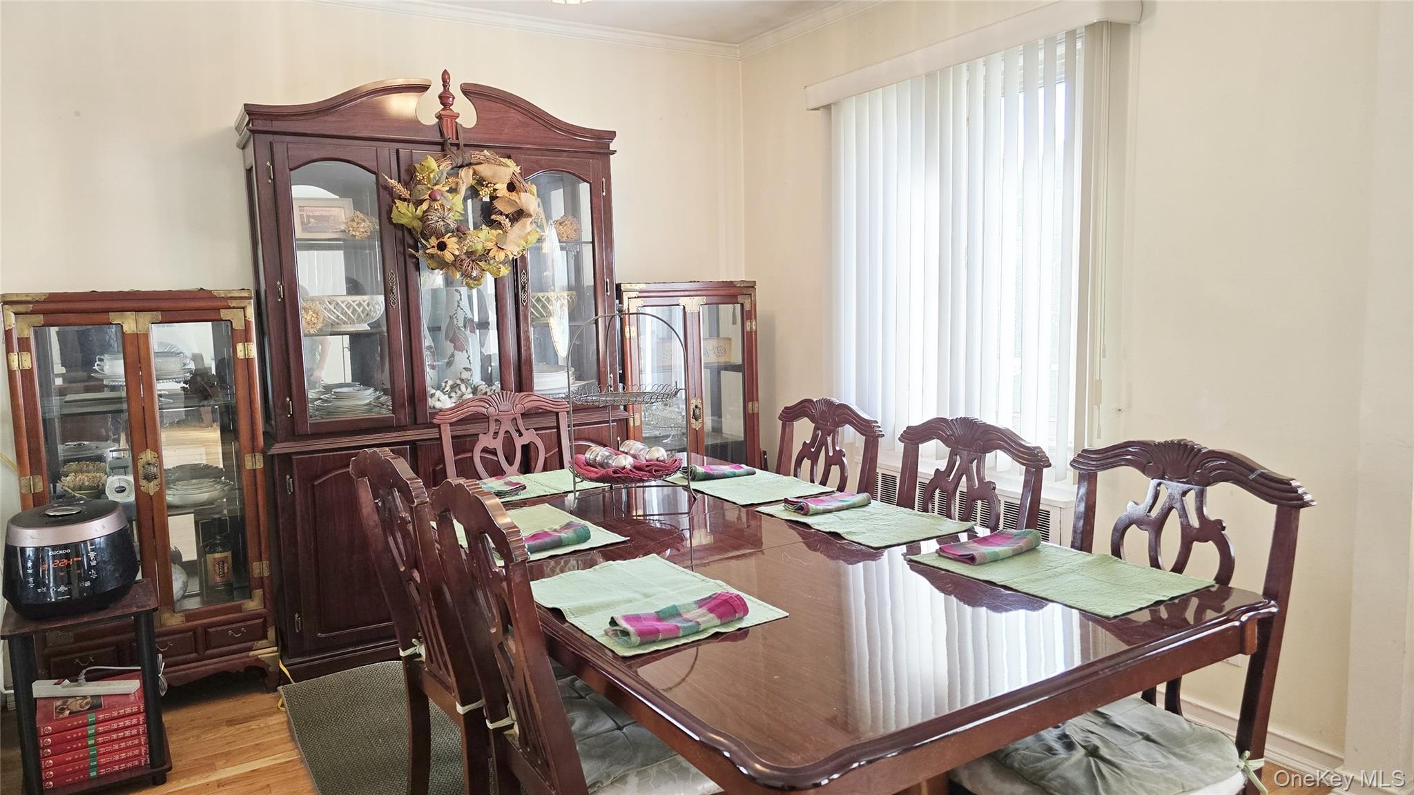 154-07 24th Road Queens, NY 11357 - Photo 5 of 16 a view of a dining room with furniture and window