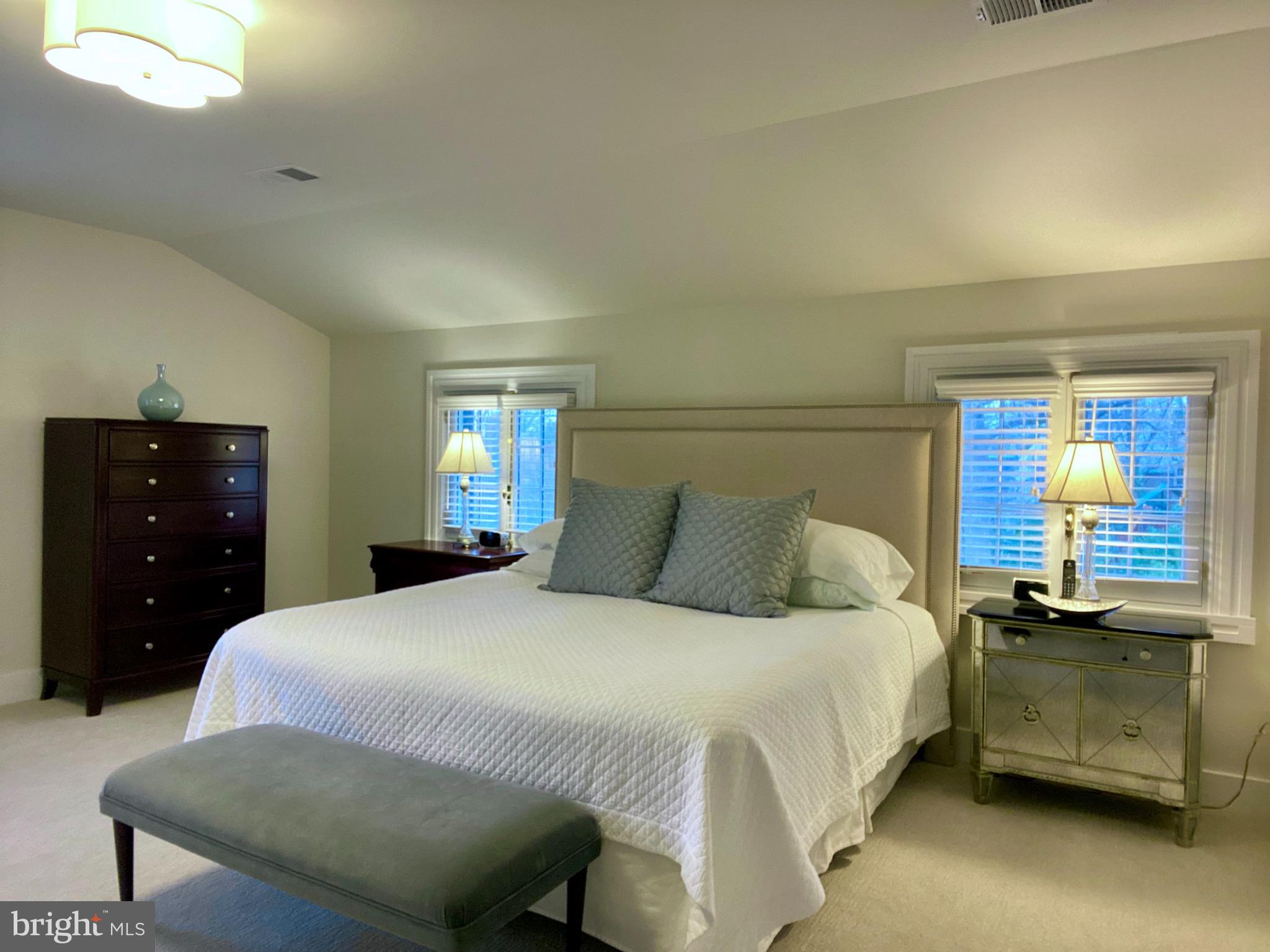 121 Upnor Road Baltimore, MD 21212 - Photo 51 of 79 a bedroom with a bed and a night stand