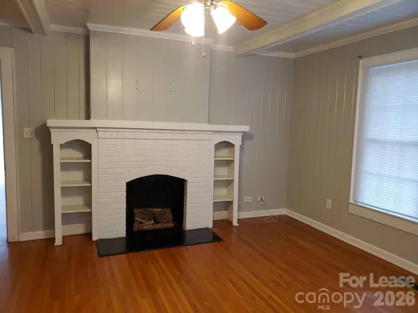 a living room with a fireplace