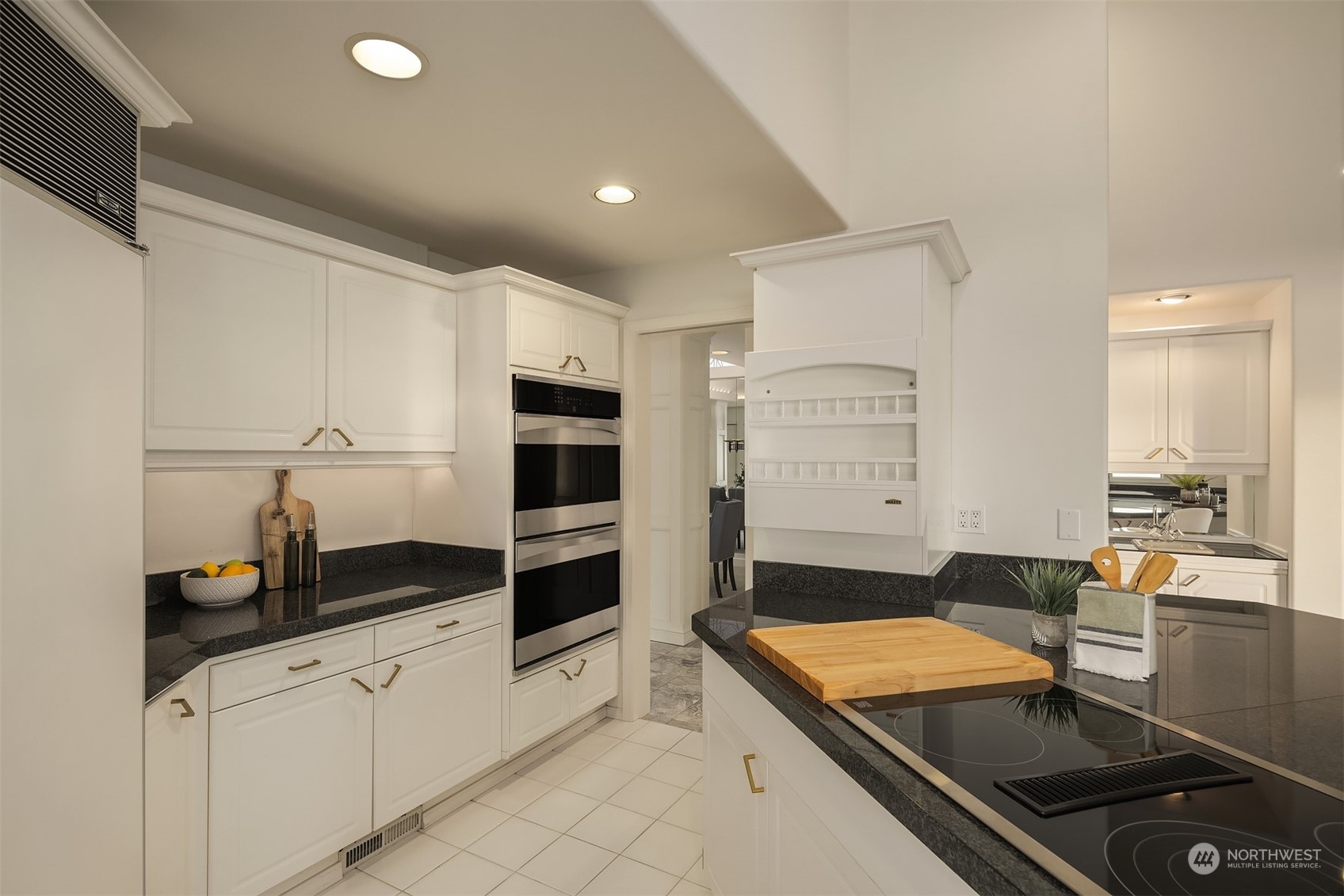 1220 Viewland Way Edmonds, WA 98020 - Photo 13 of 40 a kitchen with a sink appliances and cabinets