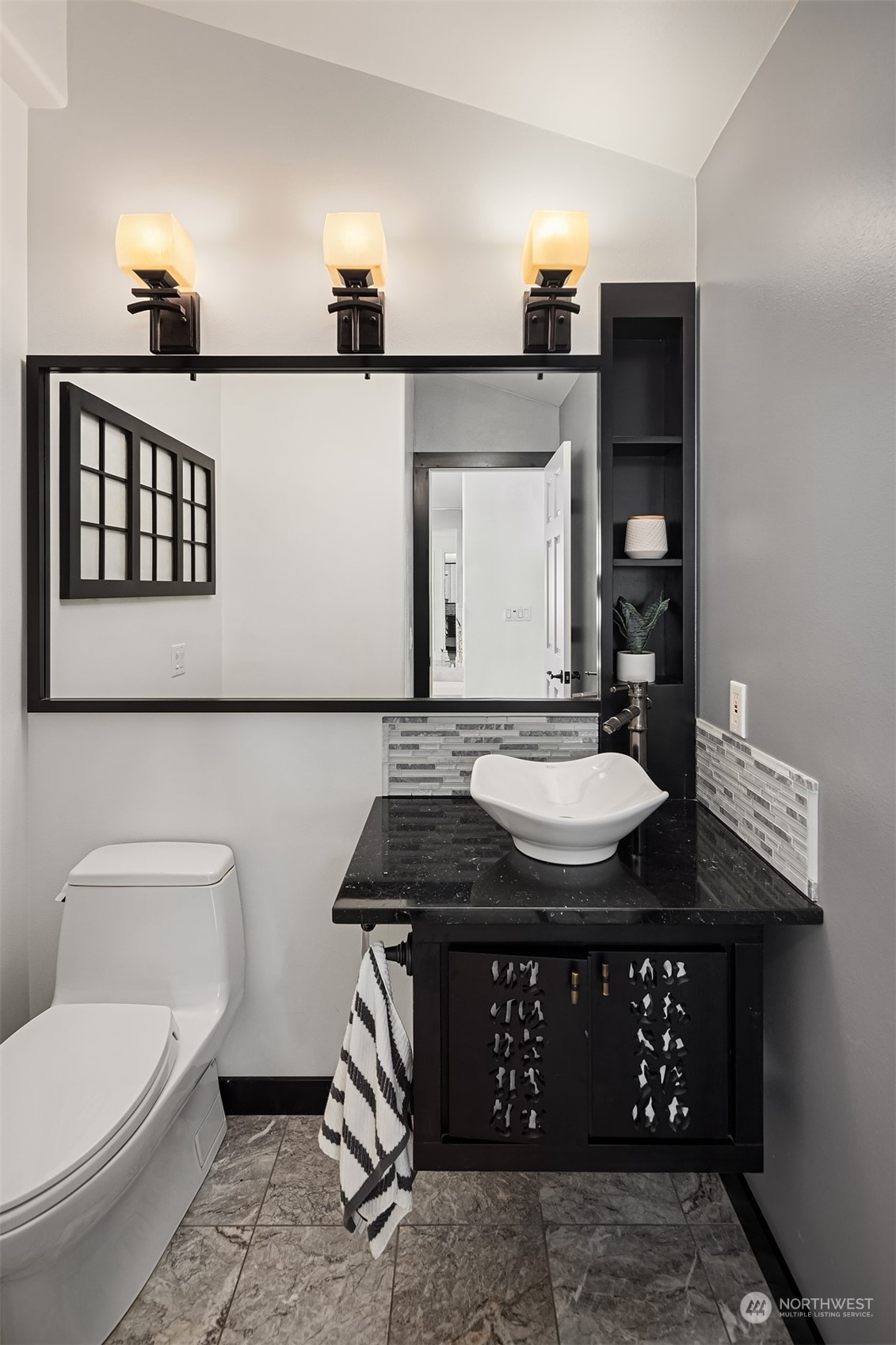 1220 Viewland Way Edmonds, WA 98020 - Photo 20 of 40 a bathroom with a granite countertop sink a toilet and mirror