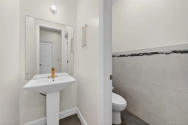 a bathroom with a sink and vanity