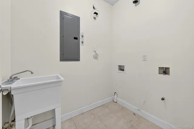 a bathroom with a toilet sink a mirror and shower