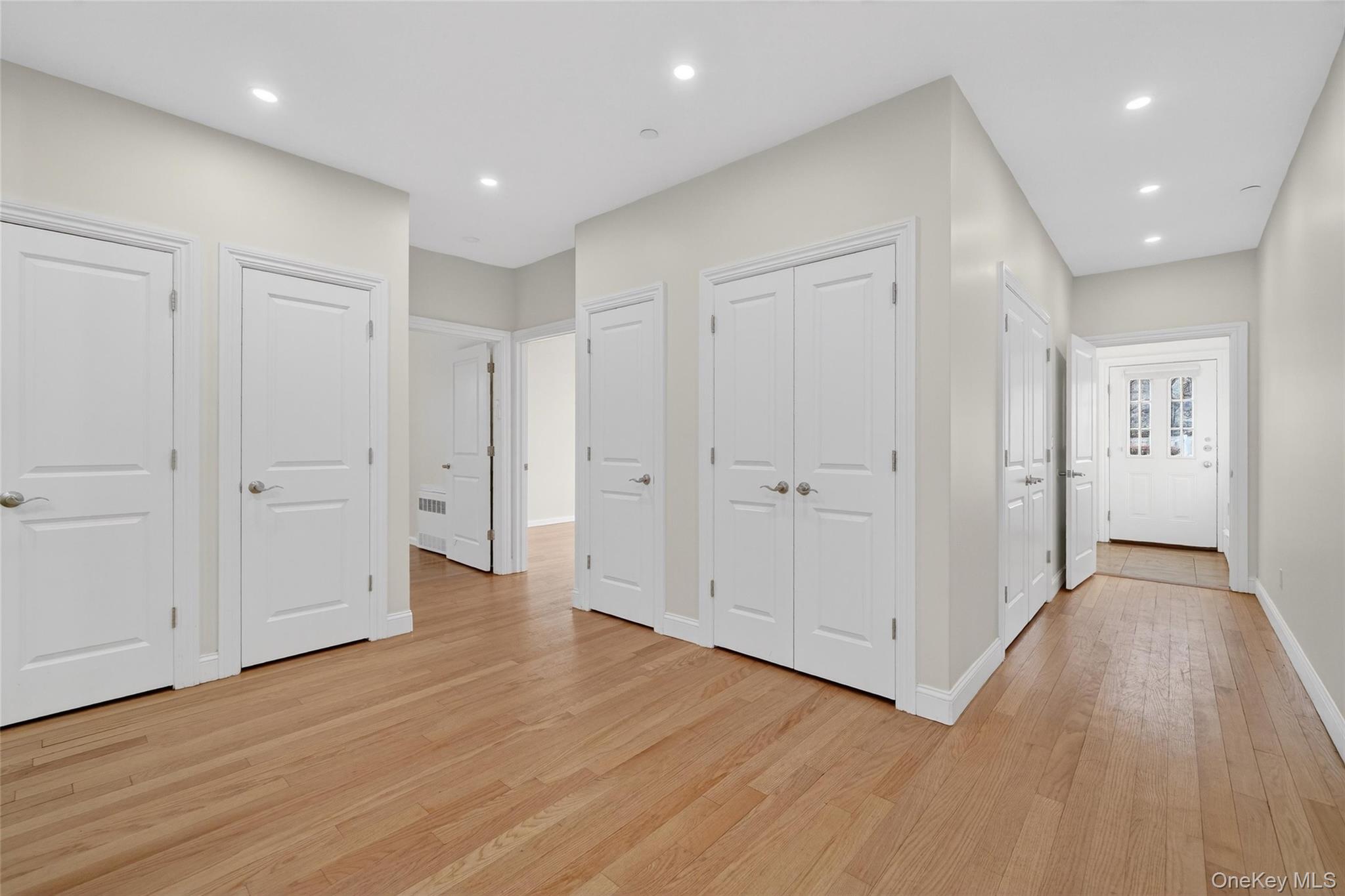 2 Bluefield Drive, Unit 103 Spring Valley, NY 10977 - Photo 7 of 42 a view of a hallway with wooden floor