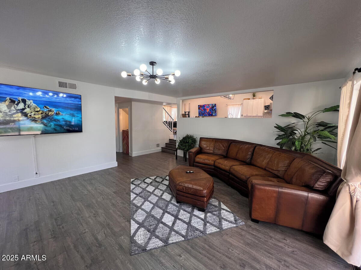 8322 West McLellan Road Glendale, AZ 85305 - Photo 12 of 30 a living room with furniture and a couch