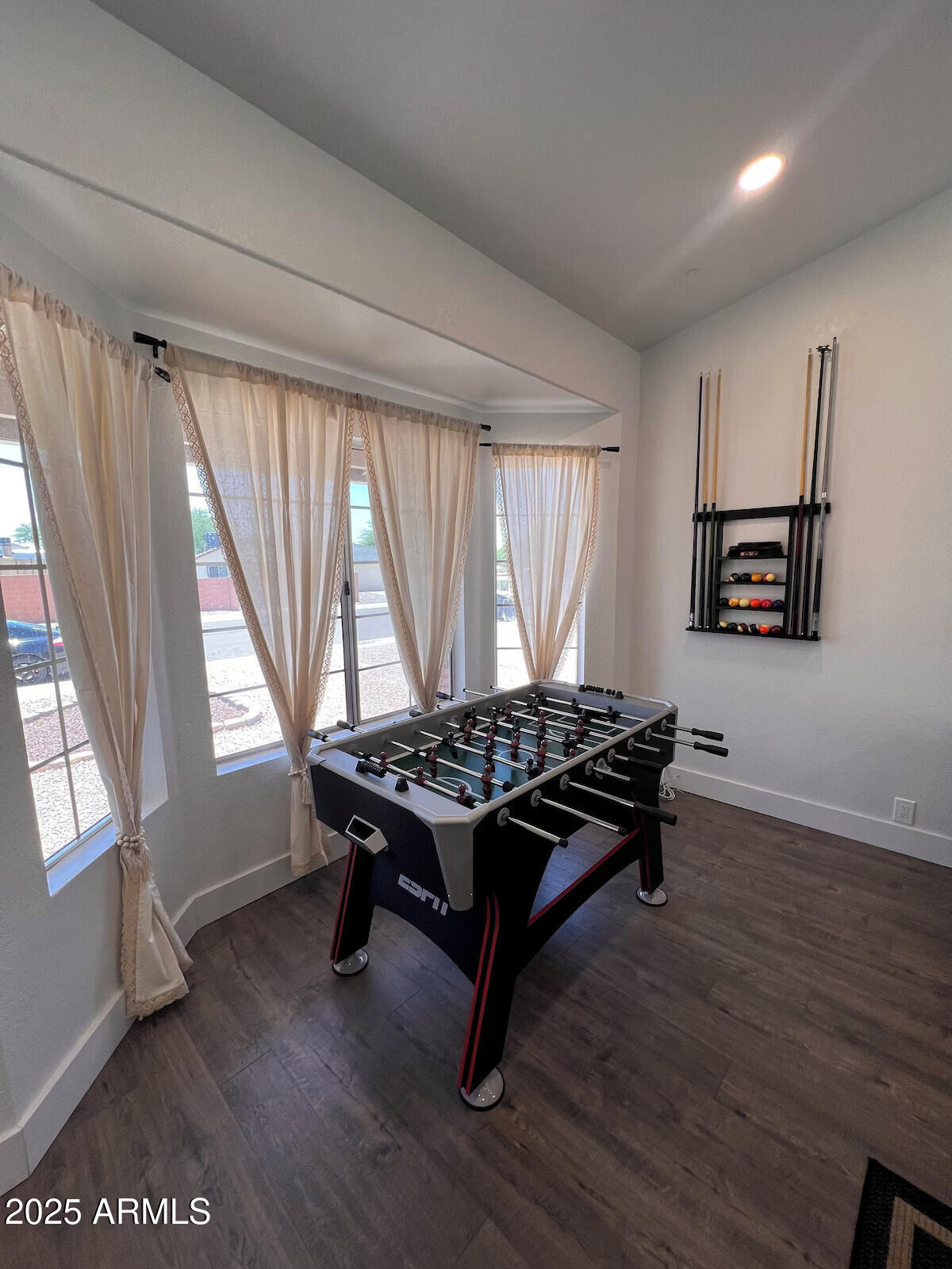 8322 West McLellan Road Glendale, AZ 85305 - Photo 26 of 30 a living room with a table chair and a window