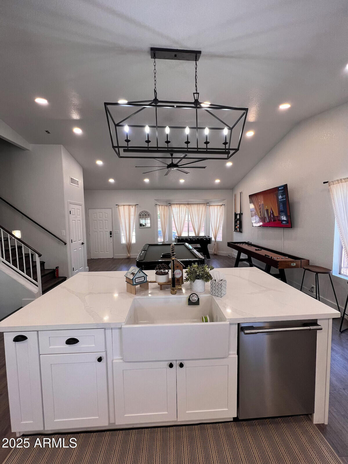 8322 West McLellan Road Glendale, AZ 85305 - Photo 4 of 30 a room with stainless steel appliances kitchen island a large island in it
