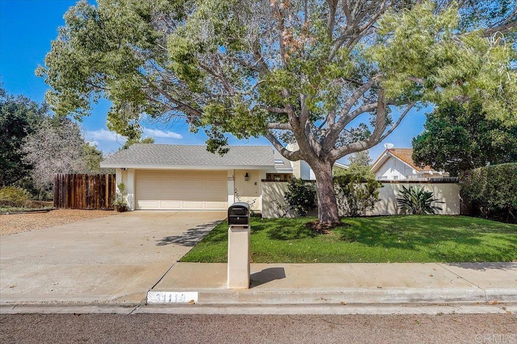 31110 Old River Road Bonsall, CA 92003 - Photo 1 of 1 a front view of house with yard and green space