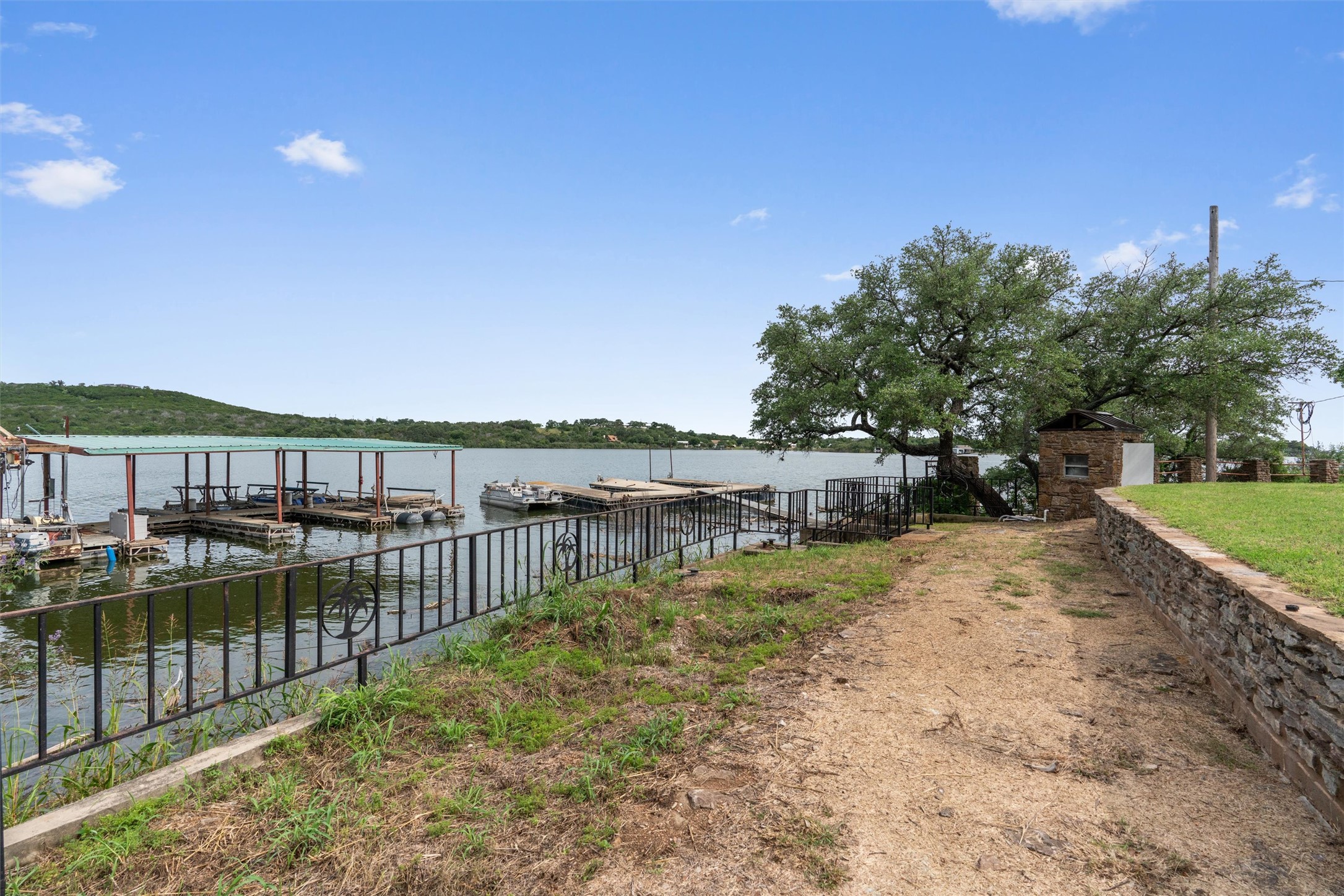 325 Eagle Rest Burnet, TX 78611 - Photo 25 of 40 A private waterfront retreat with multiple boat docks and lush mature trees.