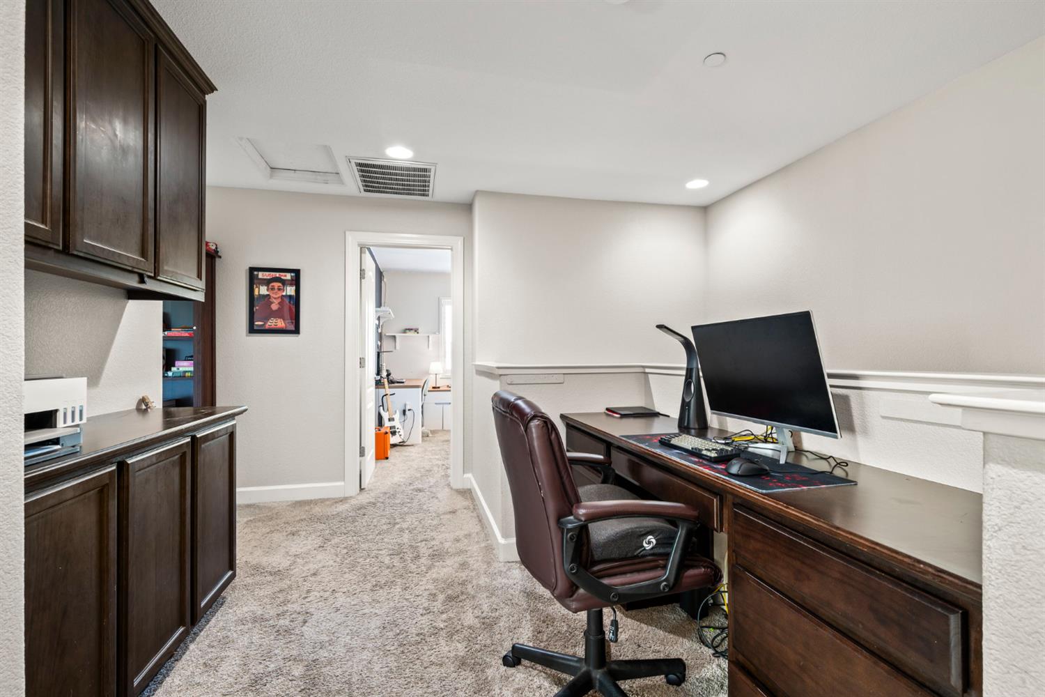 203 Rivage Circle, Unit 203 Folsom, CA 95630 - Photo 16 of 30 a workspace with furniture and wooden floor