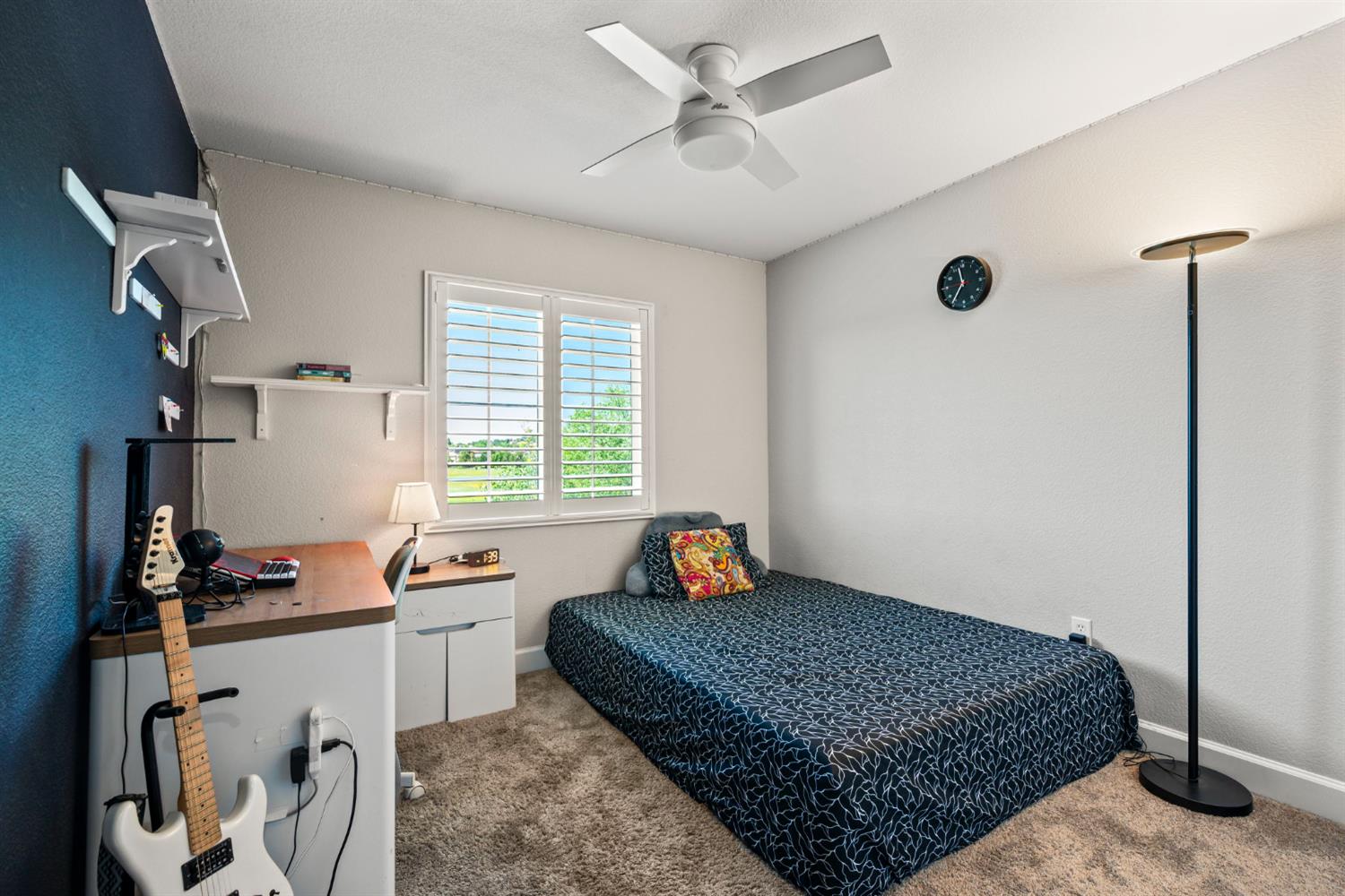 203 Rivage Circle, Unit 203 Folsom, CA 95630 - Photo 22 of 30 a bedroom with bed and window