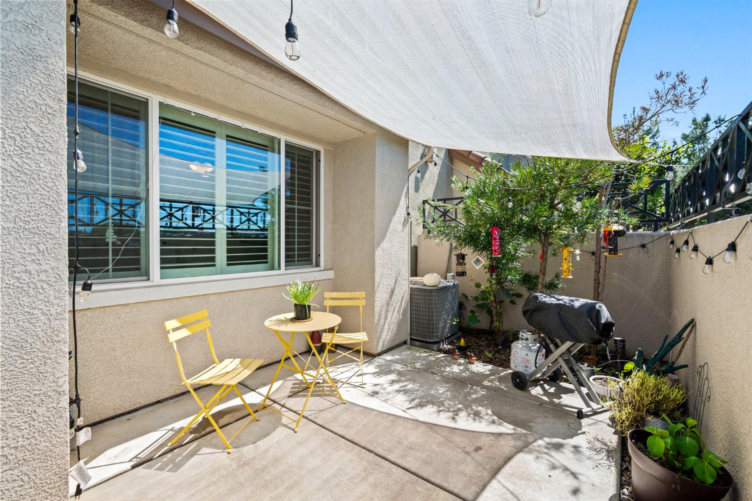 203 Rivage Circle, Unit 203 Folsom, CA 95630 - Photo 27 of 30 a balcony with furniture and a potted plant