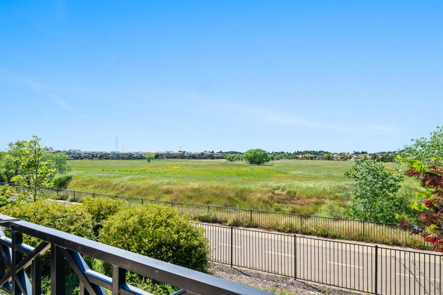 203 Rivage Circle, Unit 203 Folsom, CA 95630 - Photo 28 of 30 a view of city and ocean from a balcony