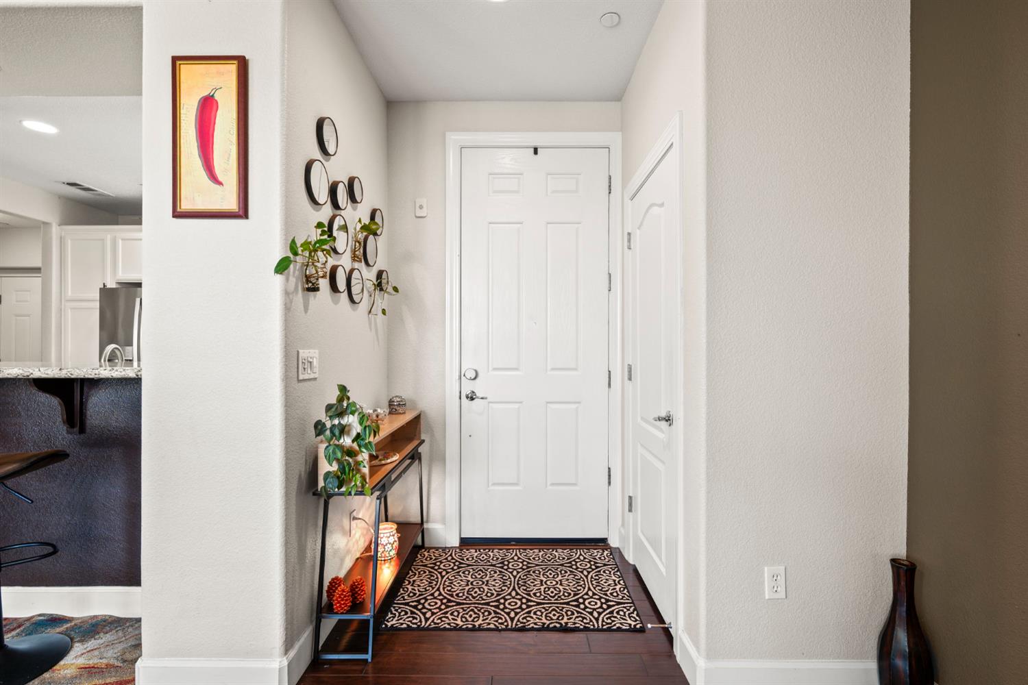 203 Rivage Circle, Unit 203 Folsom, CA 95630 - Photo 4 of 30 a view of an entryway with wooden floor