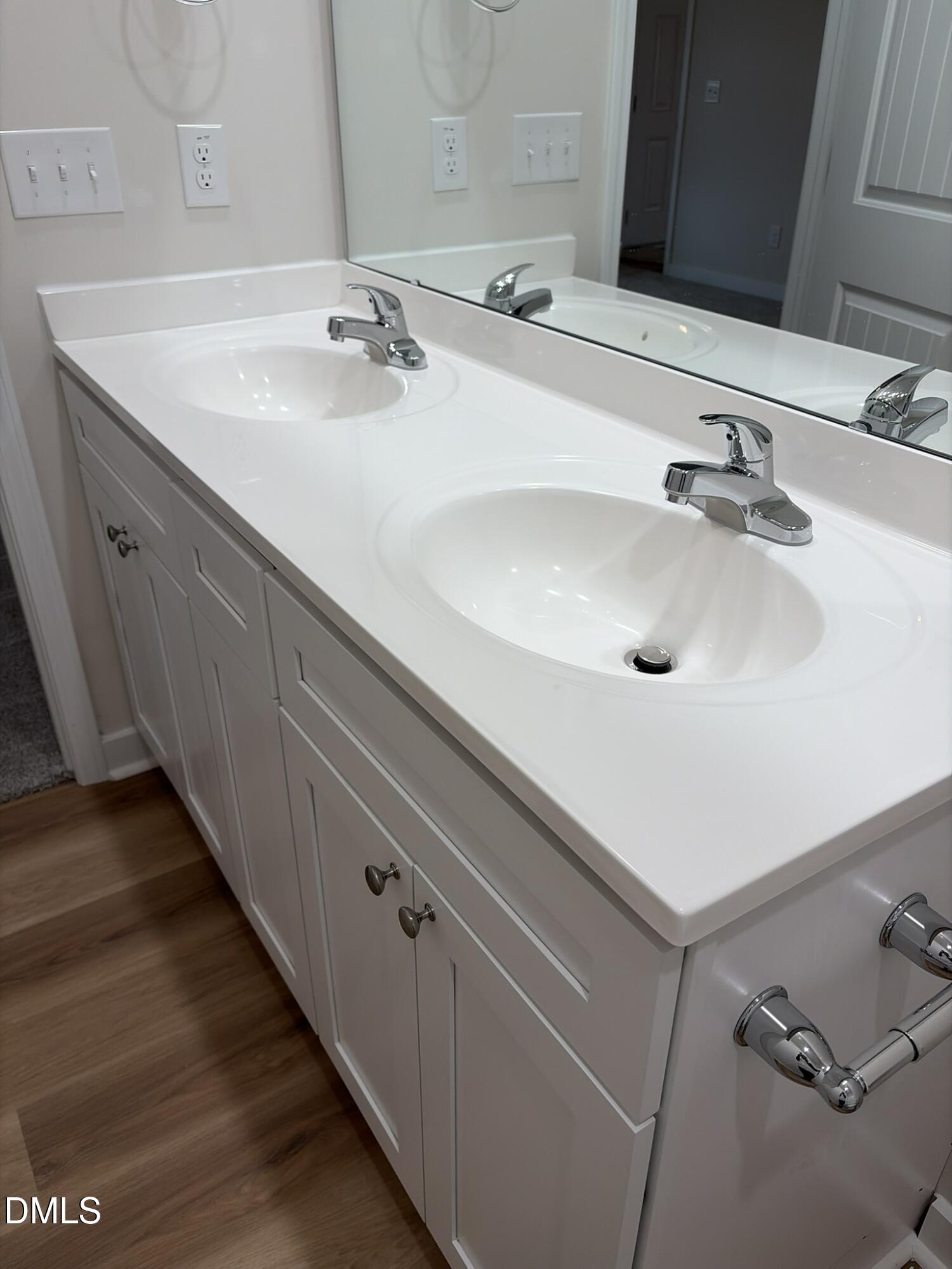 219 Jacobs Ridge Drive Four Oaks, NC 27524 - Photo 8 of 19 a bathroom with a sink and a mirror