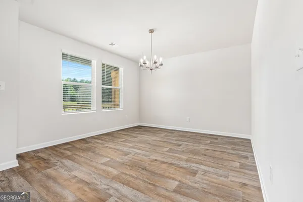 a view of a room with windows