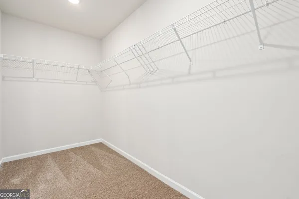 a view of a room with racks on the wall