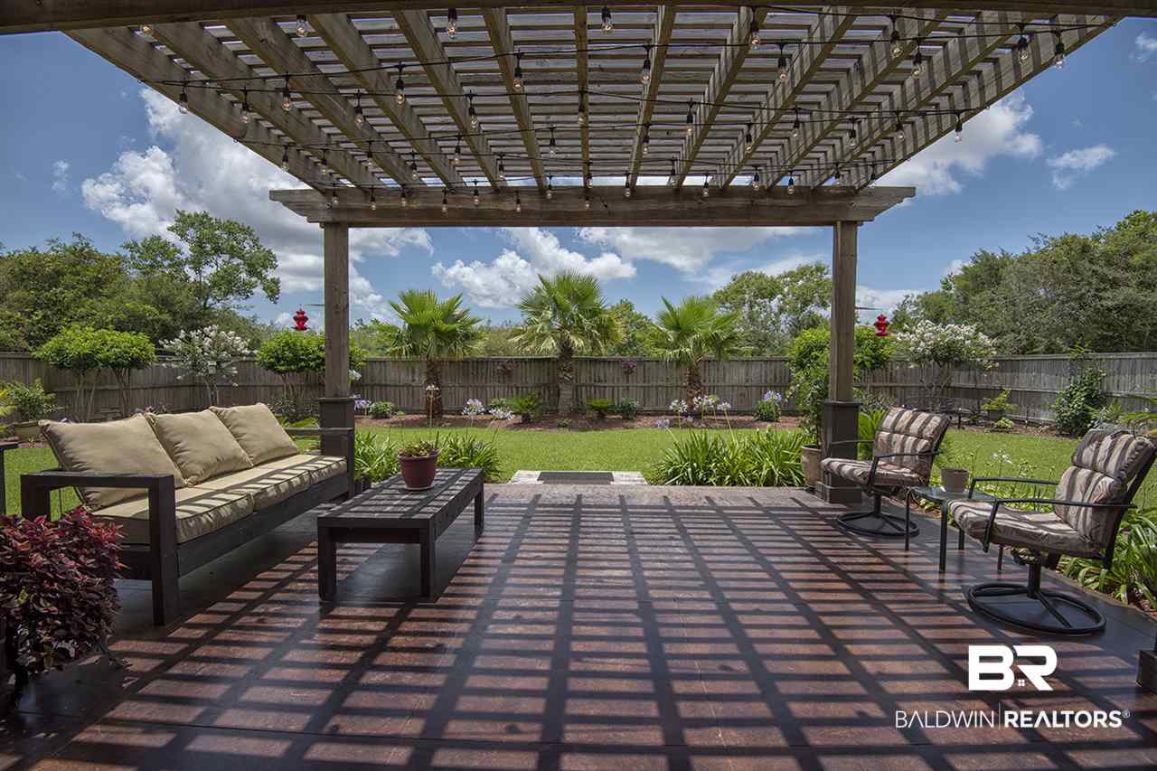 7023 Rocky Rd Loop Gulf Shores, AL 36542 - Photo 16 of 34 Outdoor Sitting Area