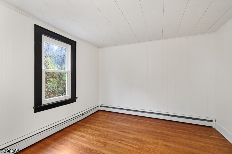 34 Old Mountain Road Lebanon, NJ 08833 - Photo 17 of 26 a view of a room with wooden floor and windows