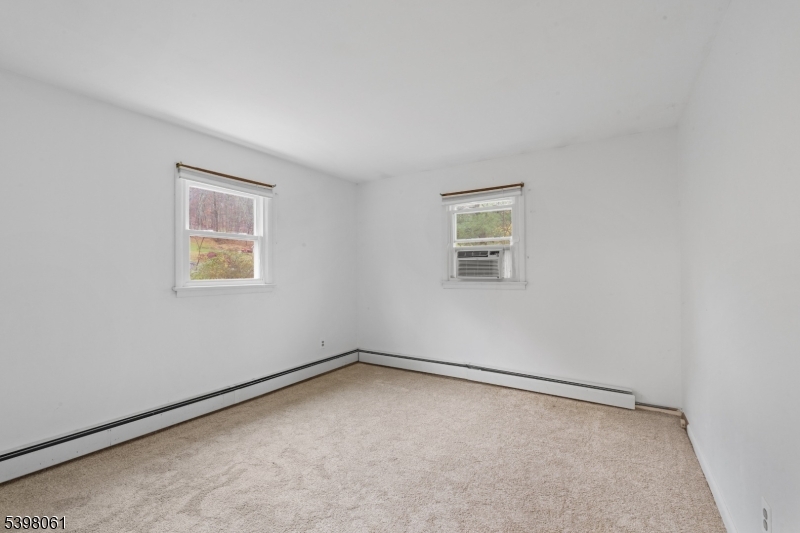 34 Old Mountain Road Lebanon, NJ 08833 - Photo 21 of 26 an empty room with a window