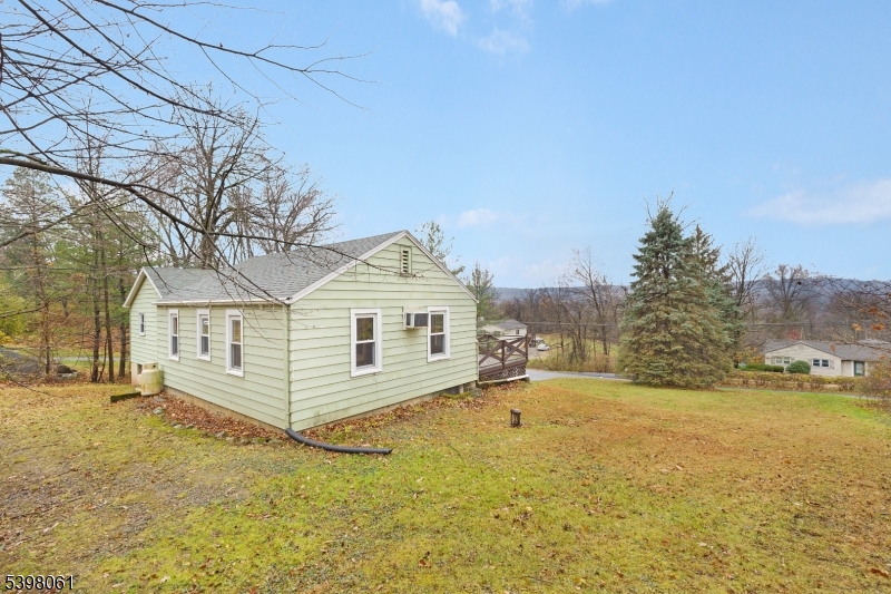 34 Old Mountain Road Lebanon, NJ 08833 - Photo 23 of 26 a view of a house with a yard