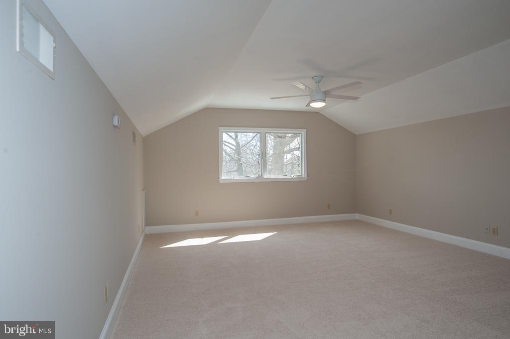 6525 Joyce Road Alexandria, VA 22310 - Photo 18 of 51 an empty room with a window and a ceiling fan