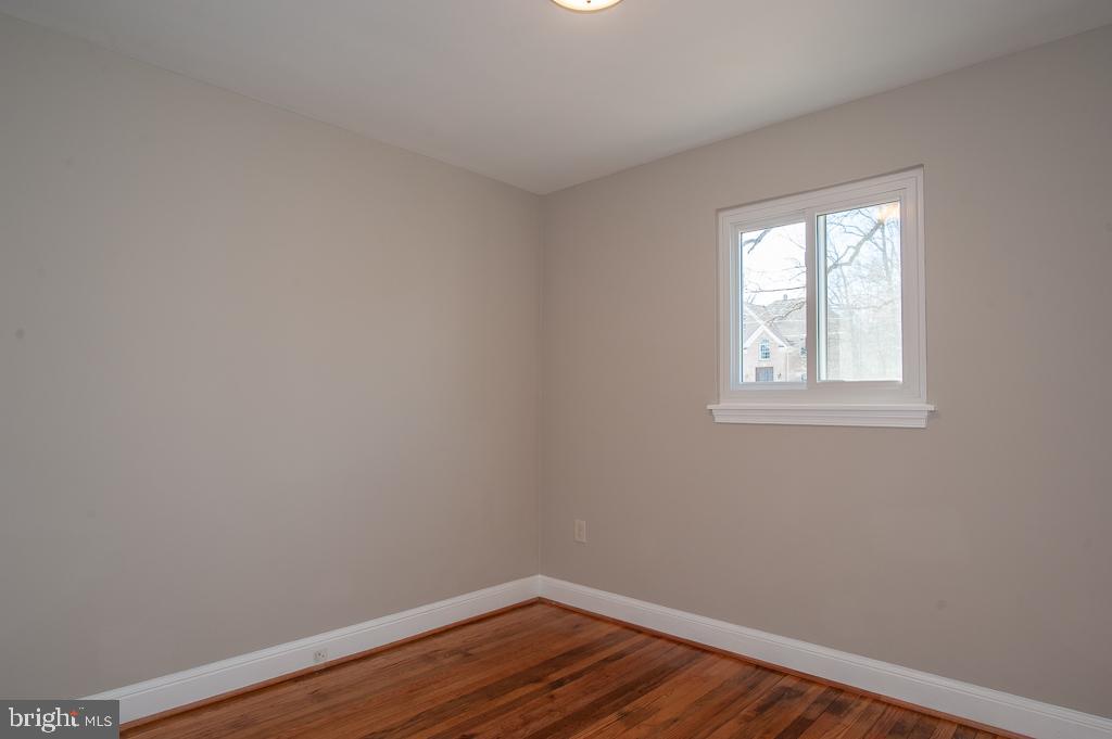6525 Joyce Road Alexandria, VA 22310 - Photo 36 of 51 a view of a small space with wooden floor and a window