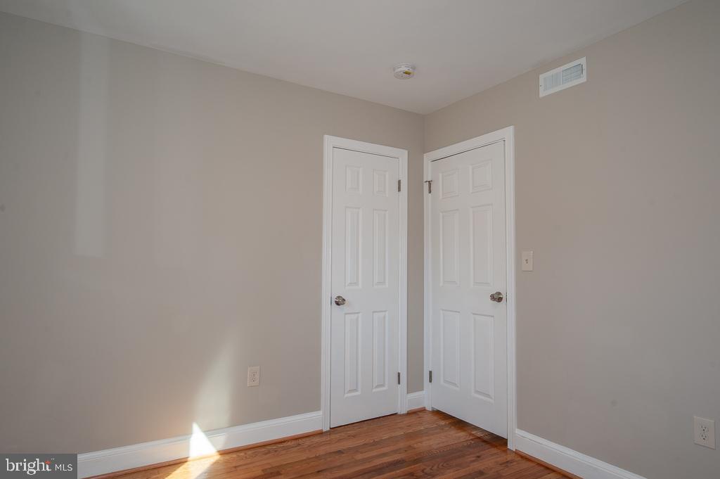 6525 Joyce Road Alexandria, VA 22310 - Photo 37 of 51 a view of empty room with wooden floor