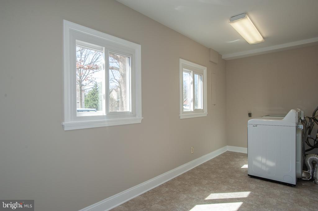 6525 Joyce Road Alexandria, VA 22310 - Photo 44 of 51 a utility room with a window dryer and washer