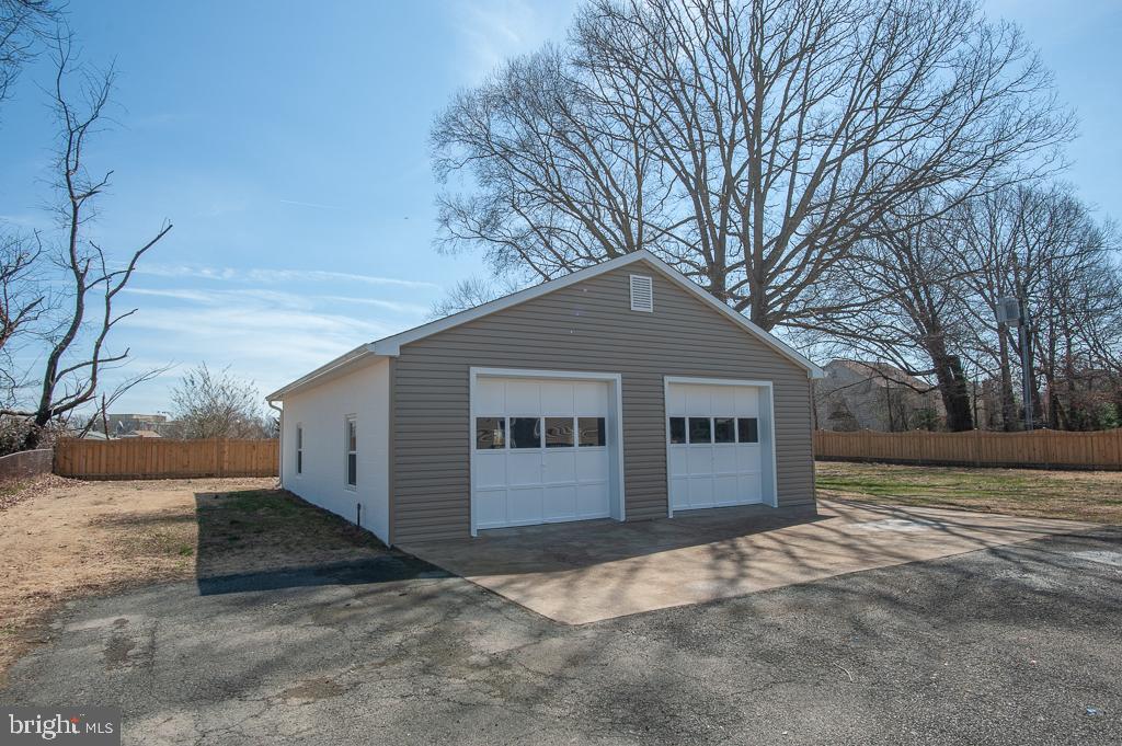 6525 Joyce Road Alexandria, VA 22310 - Photo 47 of 51 a house with trees in front of it